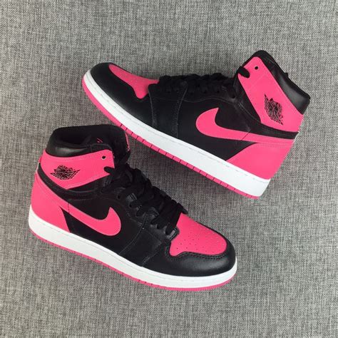 pink and black women nike